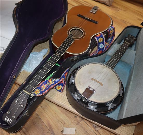 A cased ukulele and a cased Melodyuke